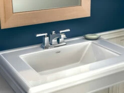 Boardwalk Chrome Two-Handle Low Arc Bathroom Faucet