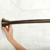 Curved Shower Rods Old World Bronze Tension Curved Shower Rod 1 Curved Shower Rods Old World Bronze Tension Curved Shower Rod -Hot Sale Moen Store csr2172owb install3.tif
